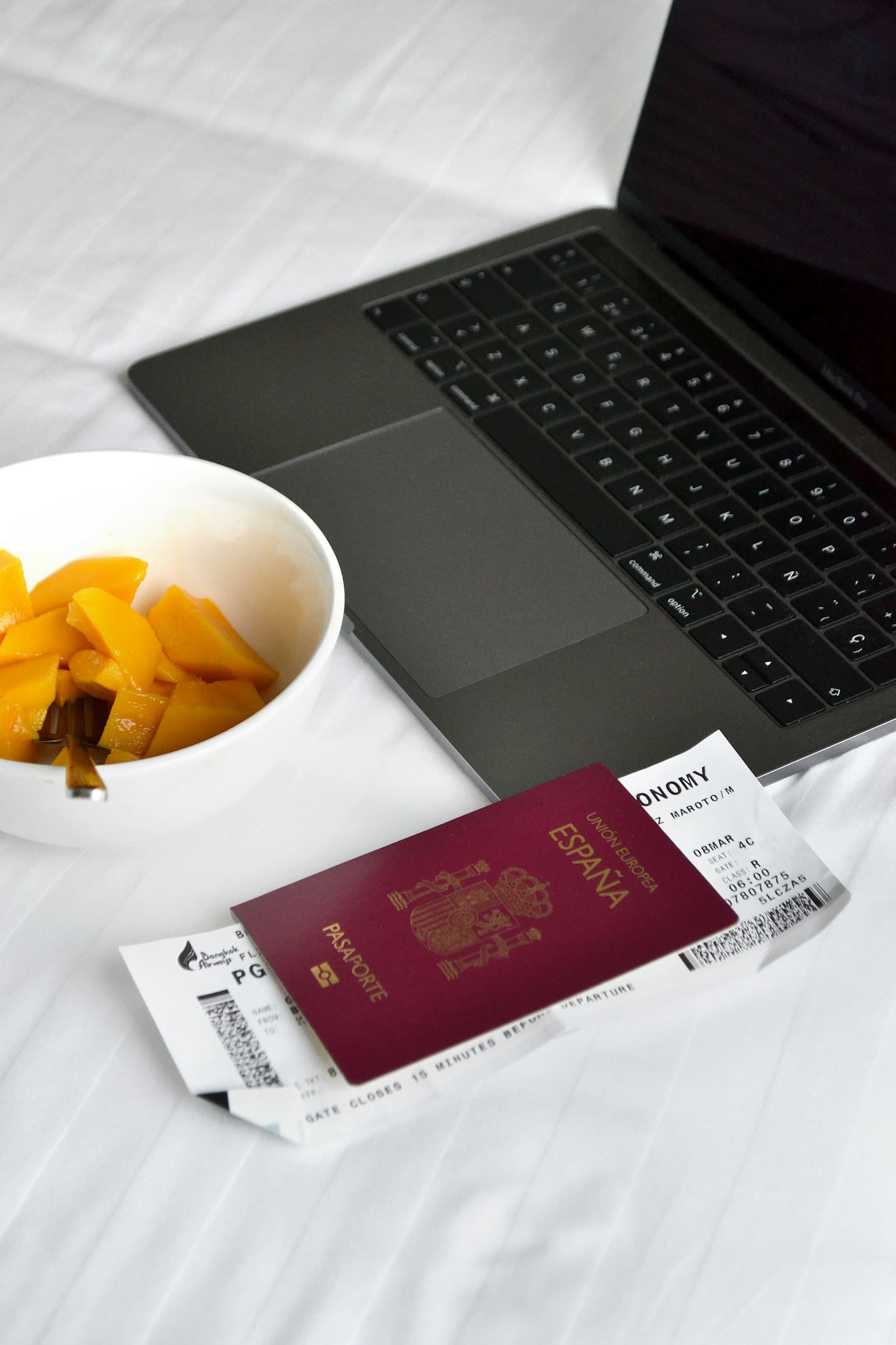 Luxury travel materials in a premium hotel setting.